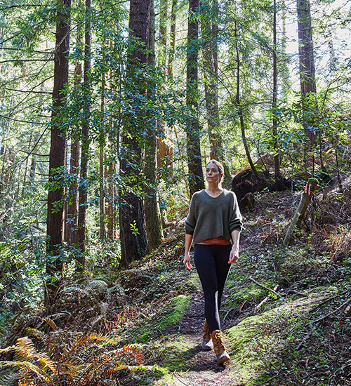 Woman exploring local forest trails